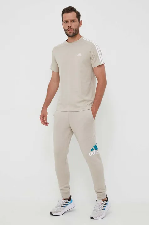 adidas spodnie dresowe kolor beżowy z nadrukiem