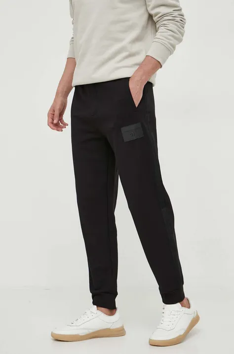 Хлопковые спортивные штаны Armani Exchange цвет чёрный однотонные