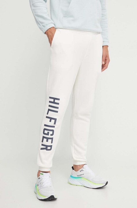 Спортивні штани Tommy Hilfiger колір бежевий з принтом