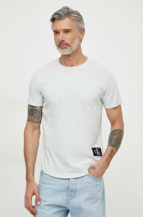 Хлопковая футболка Calvin Klein Jeans мужской цвет коричневый с аппликацией