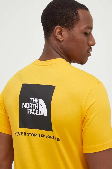 Bavlnené tričko The North Face žltá farba, s potlačou