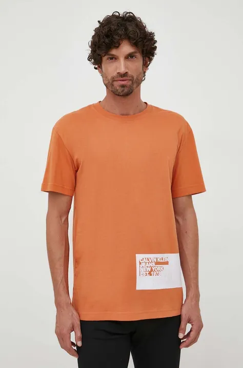 Bombažna kratka majica Calvin Klein Jeans moški, oranžna barva