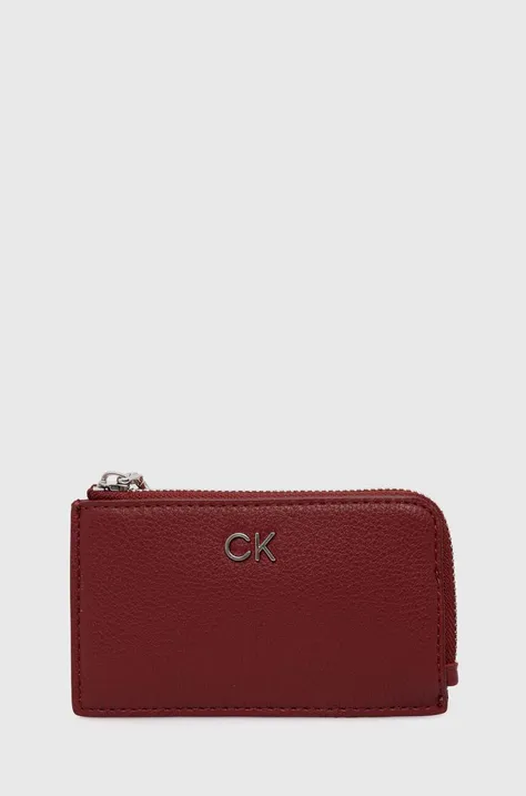 Pouzdro na karty Calvin Klein červená barva, K60K612281