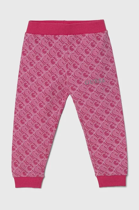 Guess spodnie dresowe bawełniane dziecięce kolor różowy wzorzyste K4YQ11 KA6R4