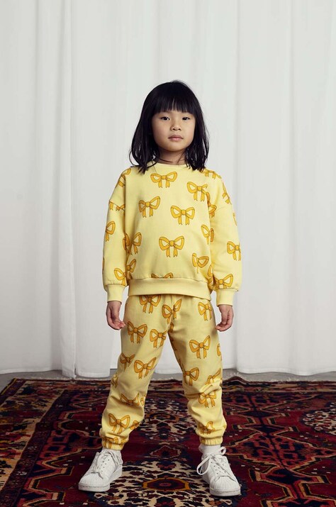 Дитячі бавовняні штани Mini Rodini Bow колір жовтий візерунок 2473013323