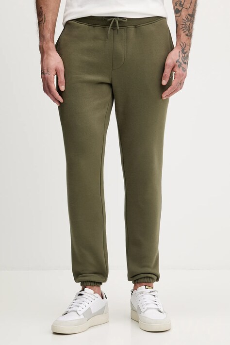 Tommy Jeans spodnie dresowe kolor zielony gładkie DM0DM20473