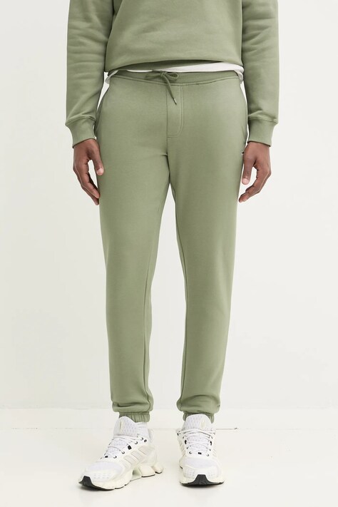 Tommy Jeans pantaloni de trening culoarea verde, neted, DM0DM20473