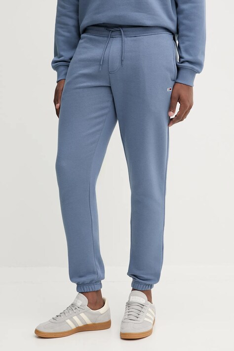 Tommy Jeans spodnie dresowe kolor niebieski gładkie DM0DM20473