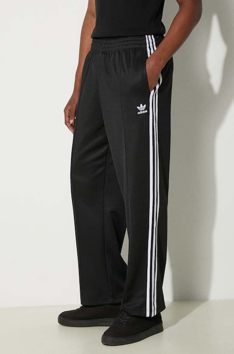 Штани adidas Originals Adicolor Baggy Fit Firebird Pant чоловічі колір чорний прямі IZ4801