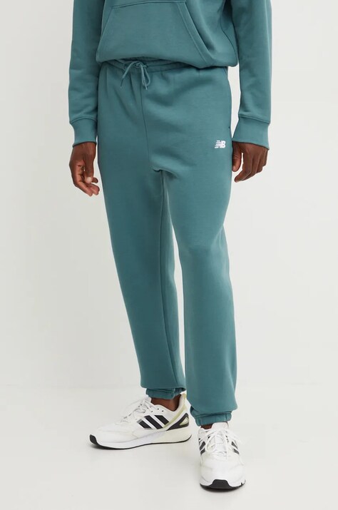 Spodnji del trenirke New Balance zelena barva, MP41503NUS