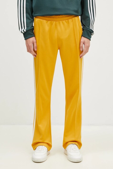 Donji dio trenirke adidas Originals 70S Track Pant boja: žuta, s aplikacijom, IX5223