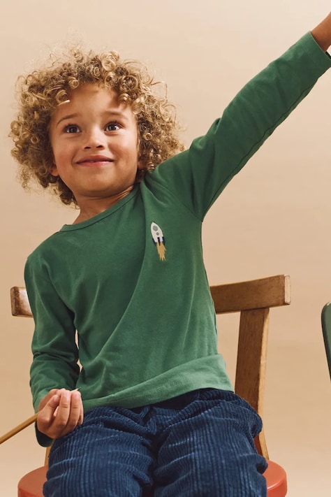 Dětské bavlněné tričko s dlouhým rukávem Liewood Apia Placement Longsleeve T-shirt zelená barva, LW20213