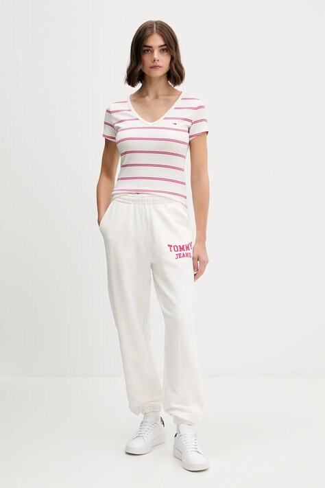 Хлопковые спортивные штаны Tommy Jeans цвет бежевый с аппликацией DW0DW22164