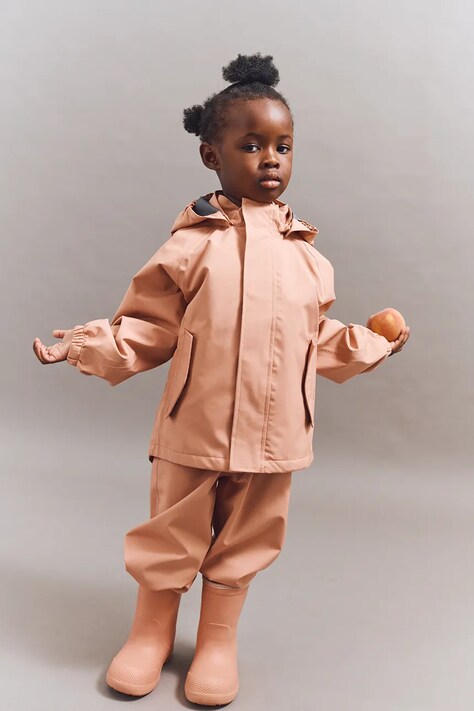 Liewood kurtka i spodnie dziecięce Pedia Rainwear Set kolor pomarańczowy LW19909