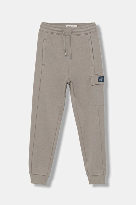 Calvin Klein Jeans spodnie dresowe bawełniane dziecięce TERRY kolor szary gładkie IB0IB02522