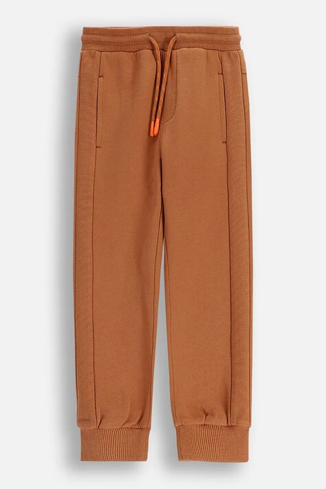 Coccodrillo spodnie dresowe dziecięce kolor brązowy wzorzyste YETI BOY KIDS