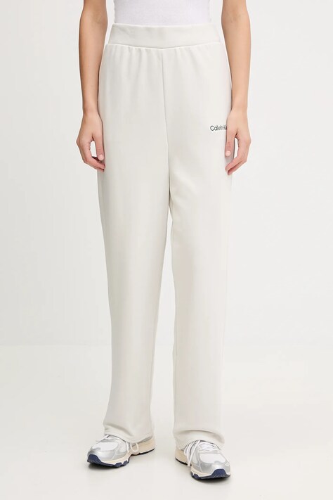 Calvin Klein Performance spodnie dresowe damskie kolor beżowy gładkie LVGWF5P627