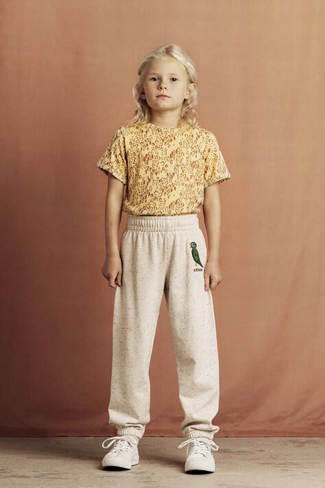 Mini Rodini pantaloni de trening din bumbac pentru copii Bird culoarea bej, cu imprimeu, 2563011111