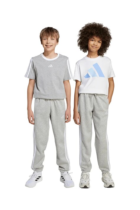 Otroški spodnji del trenirke adidas siva barva, JY4995