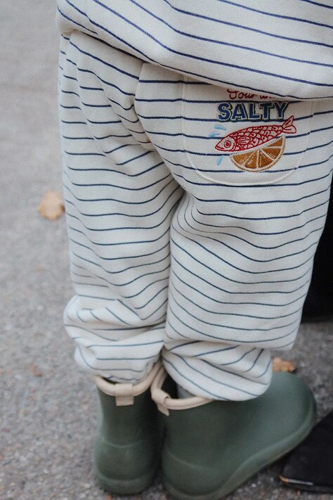 Konges Sløjd spodnie dresowe dziecięce AMIO SWEAT PANTS OCS kolor beżowy gładkie KS103670