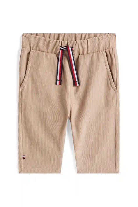 Дитячі бавовняні штанці Tommy Hilfiger колір бежевий однотонні KN0KN02053