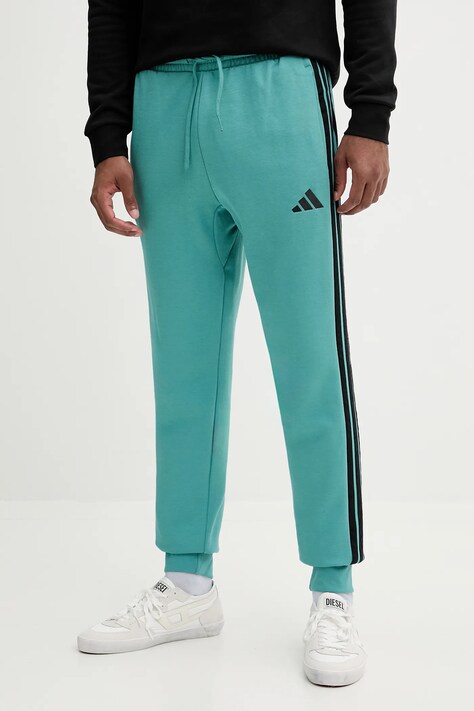 adidas spodnie dresowe Essentials męskie kolor turkusowy z aplikacją JX0711