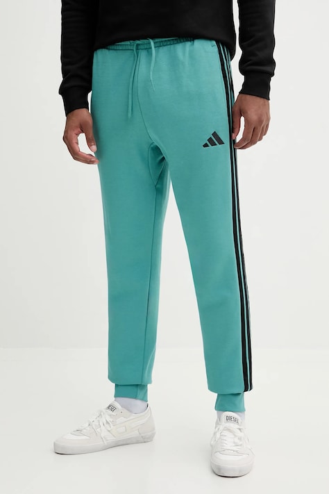Спортивные штаны adidas Essentials цвет бирюзовый с аппликацией JX0711
