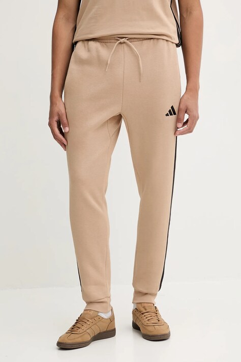 adidas spodnie dresowe Essentials męskie kolor beżowy z aplikacją JX0712