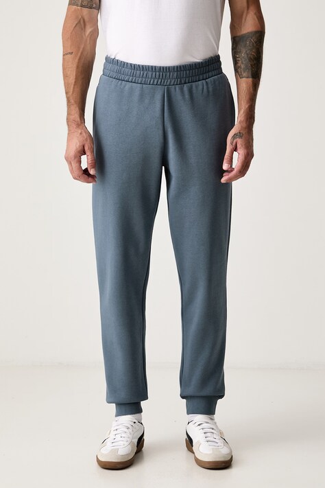 Puma Spodnie dresowe męskie z bawełną Essential Logo niebieskie regular waist 682607