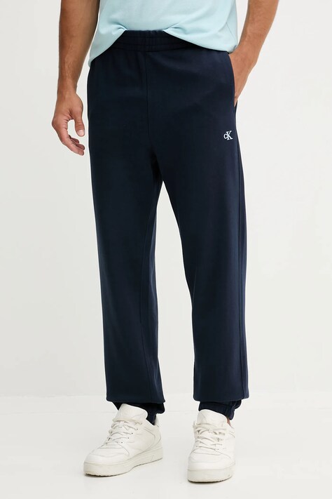 Pamučni donji dio trenirke Calvin Klein Jeans boja: tamno plava, bez uzorka, LV04RD241G