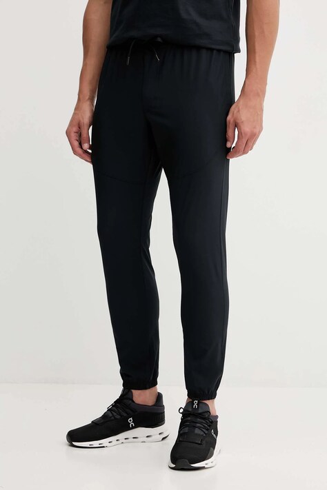 Under Armour spodnie dresowe Vibe Woven męskie kolor czarny gładkie 1386557
