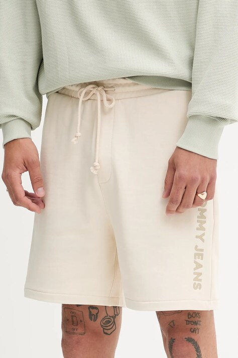 Bavlněné šortky Tommy Jeans pánské, béžová barva, DM0DM21781