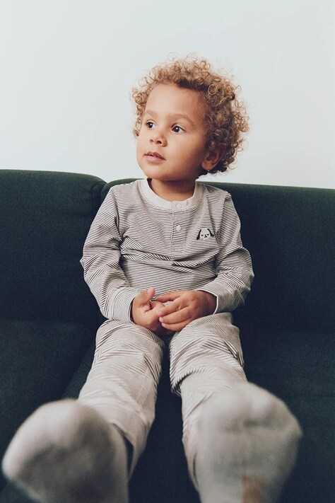 Liewood Piżama dziecięca bawełniana z elastanem Wilhelm Grow Striped Pyjamas Set granatowa LW20993