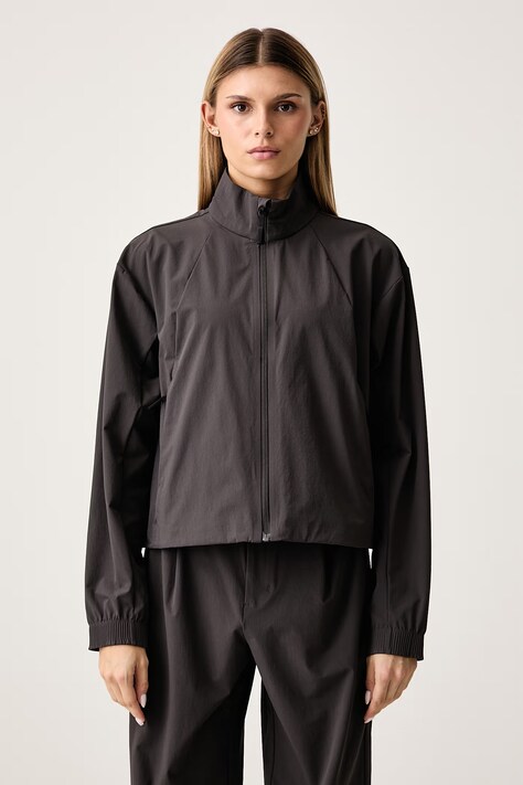 The North Face Prijelazna jakna za žene Tech Woven crna NF0A8H9NNO11