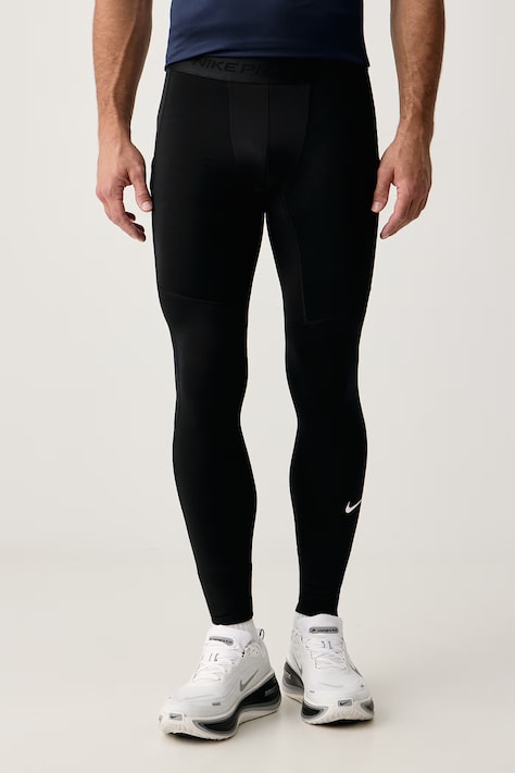Nike Legginsy sportowe męskie Nike Pro Warm czarne low waist FB7961.010