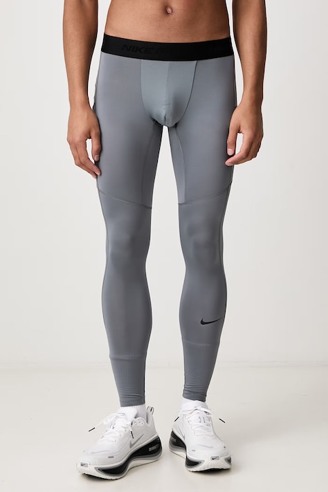 Nike Sportovní legíny pánské Pro Dri-FIT šedé regular waist FB7952.084