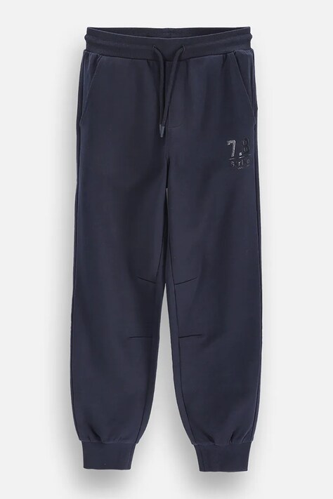 Coccodrillo Spodnie dresowe dziecięce z bawełną granatowe regular waist EVERYDAY BOY A