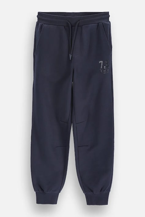 Coccodrillo Spodnie dresowe dziecięce z bawełną granatowe regular waist EVERYDAY BOY A