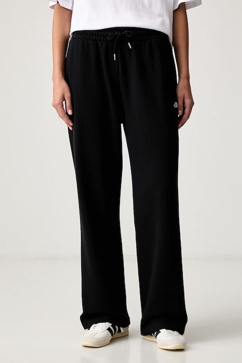The North Face spodnie dresowe damskie z bawełną Essential czarne high waist NF0A8FDSJK31