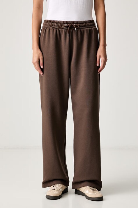 The North Face spodnie dresowe damskie z bawełną Essential brązowe regular waist NF0A8CWD1OI1