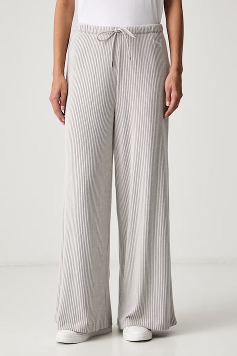 Puma spodnie dresowe damskie z wiskozą Essentials Ribbed beżowe high waist 636667