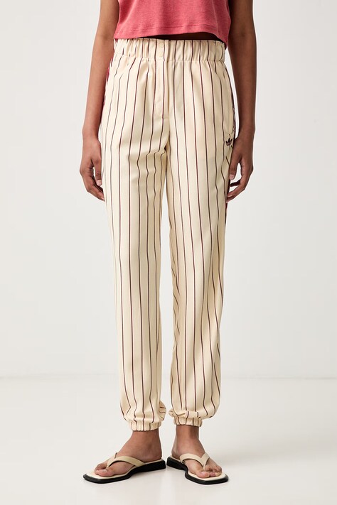 adidas Originals spodnie dresowe damskie Firebird beżowe high waist KT1851