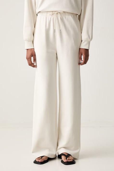 Calvin Klein teplákové nohavice dámske bavlnené béžové high waist LV044G248G