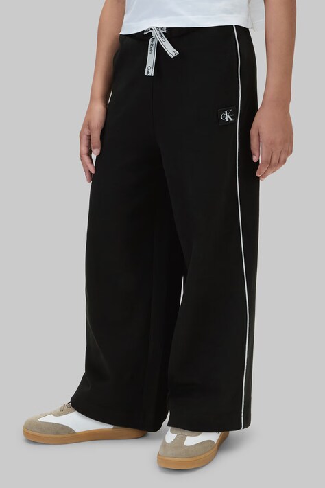 Calvin Klein Jeans Spodnie dresowe dziecięce z bawełną czarne regular waist LVCKFJC18G
