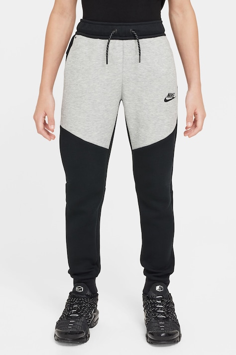 Nike Spodnie dresowe dziecięce Nike Sportswear Tech Fleece czarne regular waist HV5869