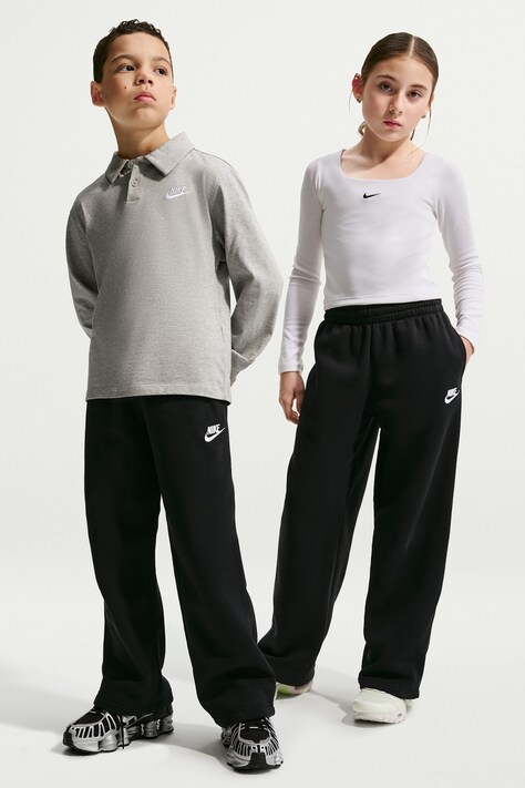 Nike Spodnie dresowe dziecięce z bawełną Nike Sportswear czarne regular waist IM5095
