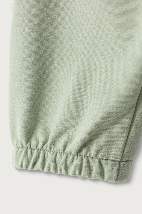 United Colors of Benetton Spodnie dresowe niemowlęce z bawełną zielone 3YWVAF02P