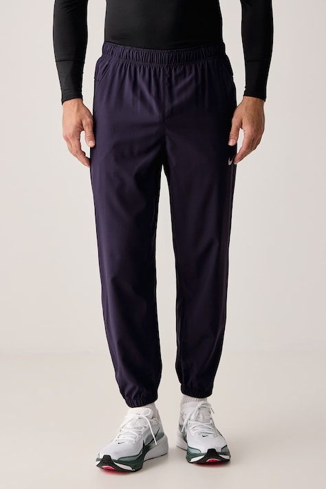 Nike Spodnie treningowe męskie Form Dri-FIT fioletowe regular waist FB7497.525