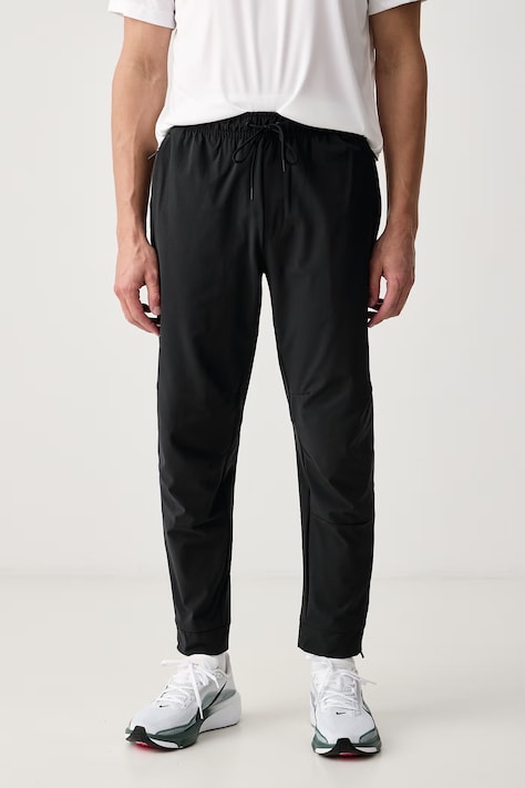 Nike Spodnie treningowe męskie Unlimited Dri-FIT czarne regular waist FB7548.010