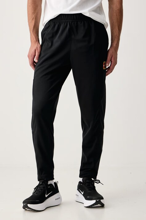Nike Sportswear Spodnie treningowe damskie NikeCourt Heritage czarne regular waist FZ6928.010